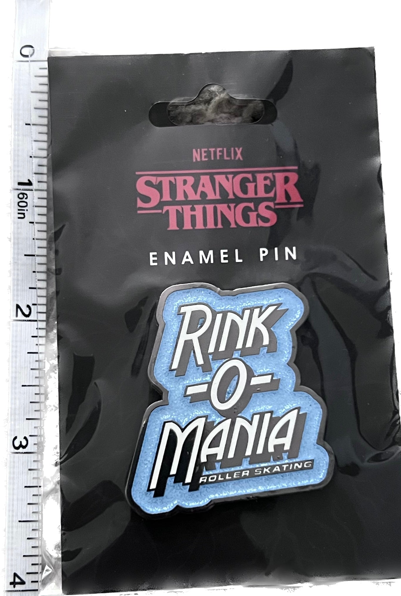 Rink-O-Mania enamel pin